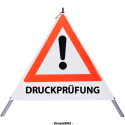 Faltsignal - Gefahrenstelle mit Text: DRUCKPRÜFUNG