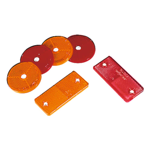 Reflektoren für Schranken in rot und orange, verschiedene Formen und Größen