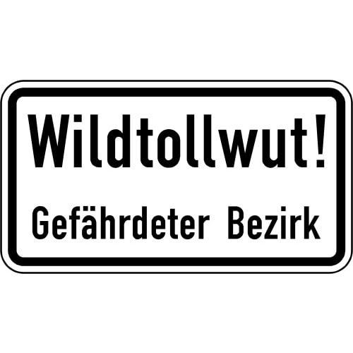 Verkehrsschild Wildtollwut! Gefährdeter Bezirk mit schwarzer Schrift auf weißem Hintergrund und schwarzem Rahmen