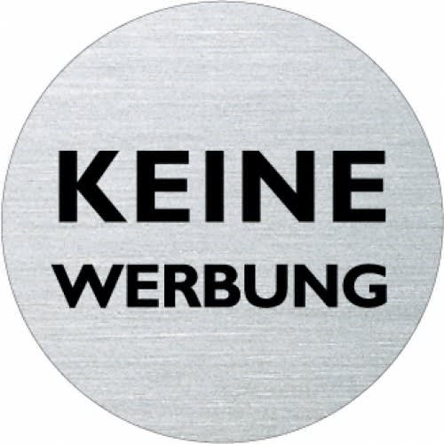 Rundes Textschild mit der Aufschrift Keine Werbung in schwarzer Schrift auf silbernem Hintergrund