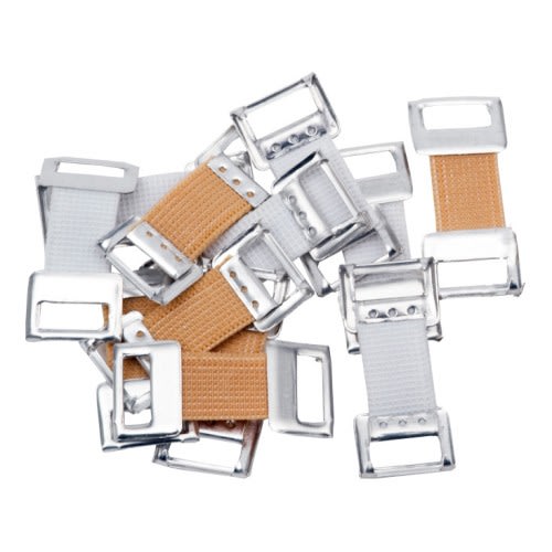 Verbandklammern aus Metall mit weißen und beigen Bändern zur Fixierung von Verbänden