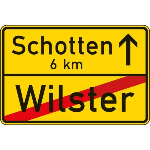 Ortstafel Rückseite Verkehrsschild VZ 311 mit Zielangabe Schotten 6 km und durchgestrichenem Wilster