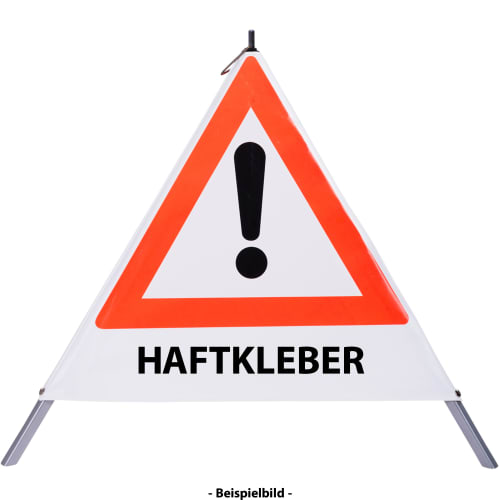 Faltsignal mit rotem Dreieck und Ausrufezeichen, Text HAFTKLEBER, Warnschild für Gefahrenstelle