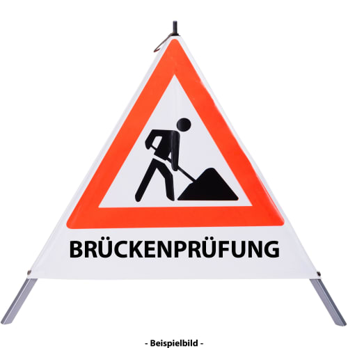 Faltsignal Baustelle mit rotem Dreieck und schwarzem Symbol eines Arbeiters mit Schaufel, Text BRÜCKENPRÜFUNG
