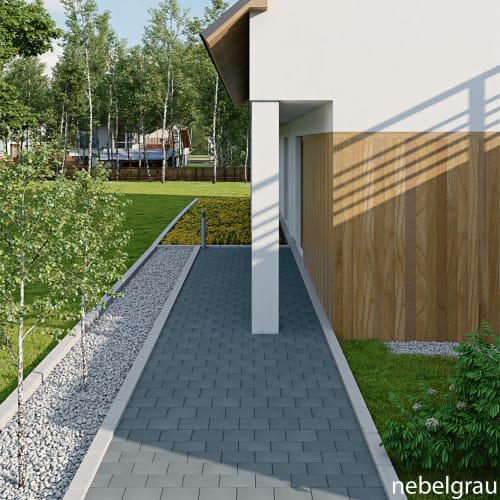 Betonpflasterstein Classico mit Fase in nebelgrau verlegt neben modernem Haus mit Garten