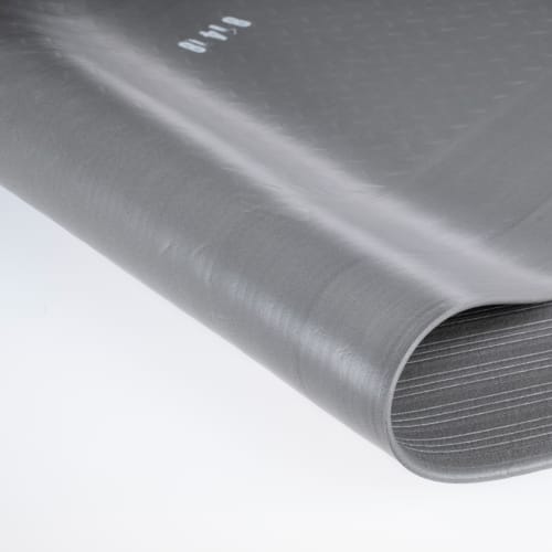 Grau gerollte Riefenmatte Arbeitsplatzmatte YOGA METER BASIC mit rutschfester Oberfläche