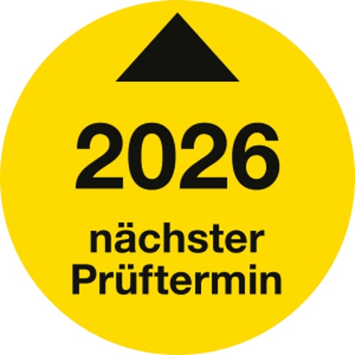 Gelbe Prüfplakette mit schwarzem Pfeil und der Jahreszahl 2026, nächster Prüftermin