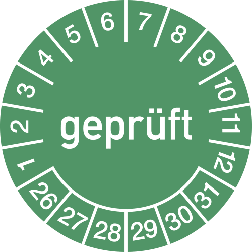 Grüne Prüfplakette mit der Aufschrift geprüft, Zahlen von 1 bis 12 für Monate und 26 bis 31 für Tage