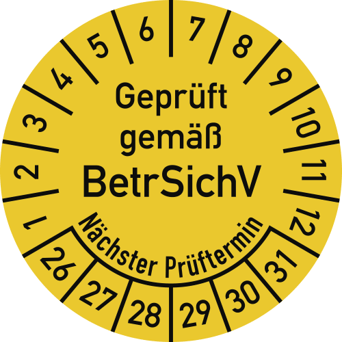 Prüfplakette gelb mit Aufschrift Geprüft gemäß BetrSichV und Nächster Prüftermin, Monats- und Tagesanzeige