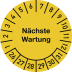 Prüfplakette mit Aufschrift Nächste Wartung und Zahlenring für Monate und Tage