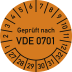 Prüfplakette orange mit Aufschrift Geprüft nach VDE 0701 und Zahlenring von 1 bis 12 und 27 bis 32