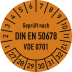 Prüfplakette orange mit Aufschrift Geprüft nach DIN EN 50678 VDE 0701 und Zahlenring von 1 bis 32