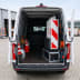 Offener Transporter mit 5 Klappbaken Set und Verkehrskegeln im Laderaum