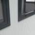Mobiles Raumsystem SmartUnit mit schmaler Ausführung und dunklem Fensterrahmen
