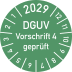 Grüne Prüfplakette mit der Aufschrift DGUV Vorschrift 4 geprüft und Jahreszahl 2029