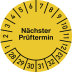 Mehrjahres Prüfplakette gelb mit Aufschrift Nächster Prüftermin und Monats- sowie Wochenangaben