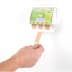 PLUM Pflasterspender QuickFix UNO mit elastischen Pflastern an der Wand montiert, Hand entnimmt Pflaster